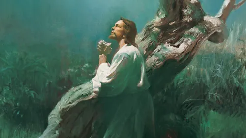 Jesus Christ kneeling in the Garden of Gethsemane