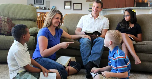 Family reading scriptures together