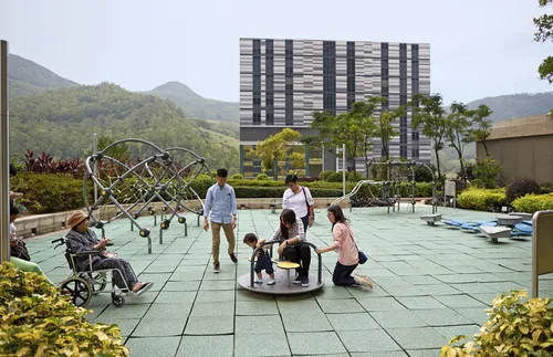 family playing together at a park