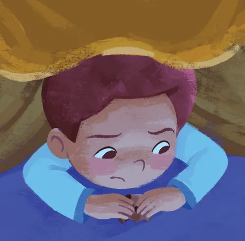 Boy looking sad under his blanket