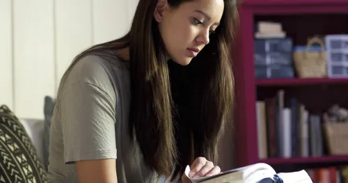 young woman reading scriptures