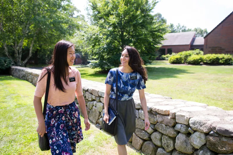 A congregation sit together in a chapel pew learning about the gospel of Jesus Christ