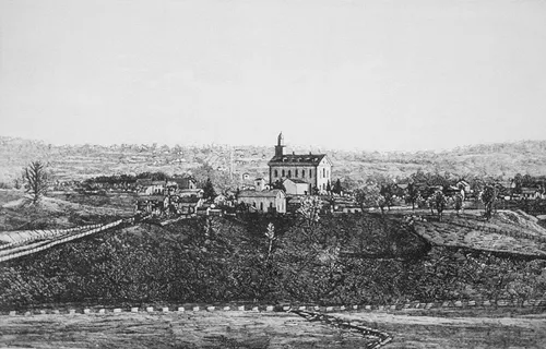 engraving of exterior of the Kirtland Temple and surrounding buildings