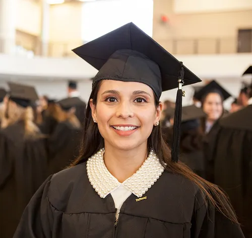 woman smiling at graduation