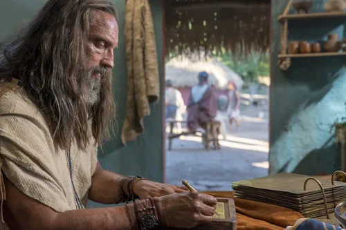 Nephi records his testimony on metal plates.