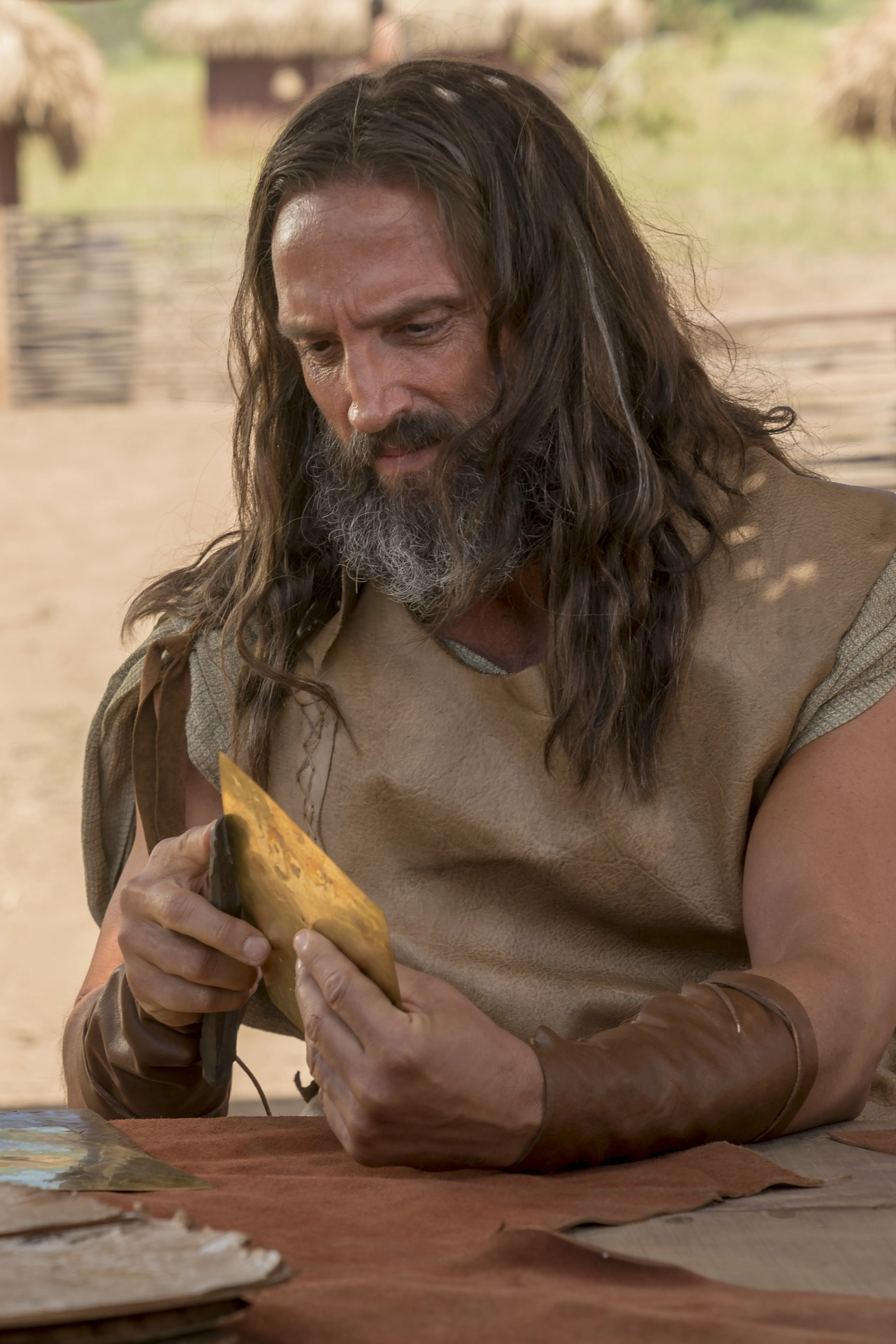 Nephi creates metal plates.