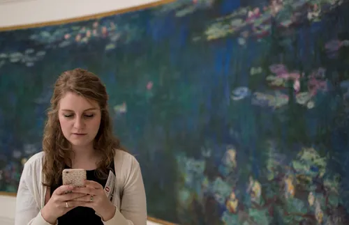 a woman looking at her phone