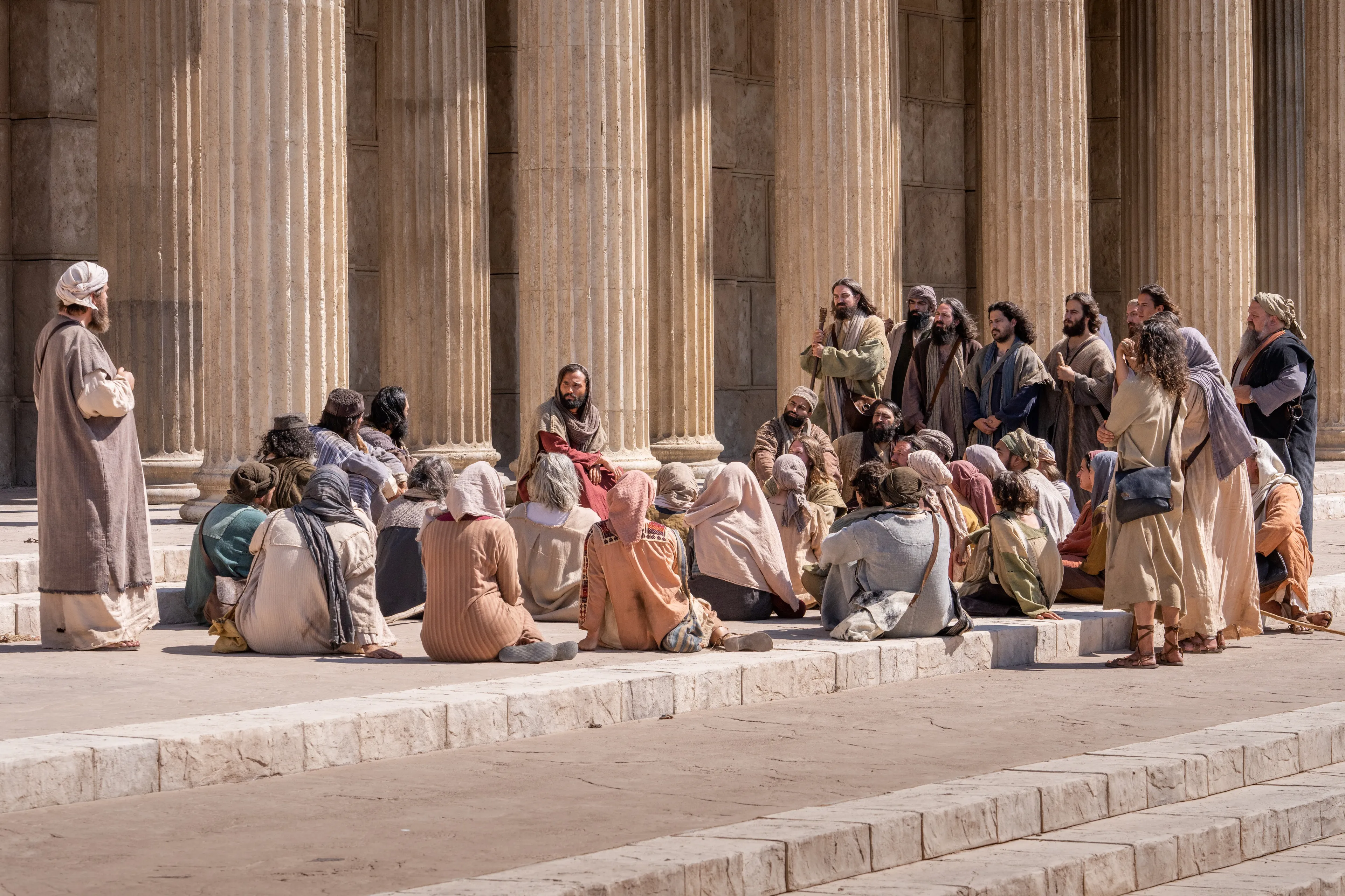 Jesus Christ teaches a small group near Jerusalem. With Him are Thomas, Simon, Peter, Philip, Andrew, John, James, Matthew, Bartholomew, Thaddeus, James son of Alpheus, and Judas.