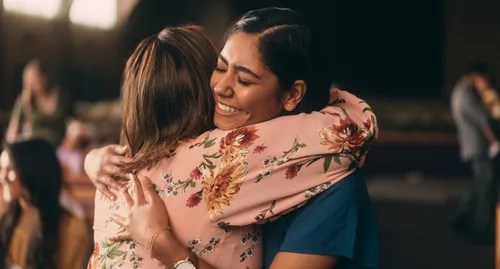 two women hugging