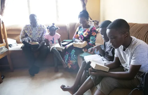 Baidoo family reading scriptures together