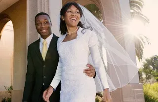 newly married couple outside a temple