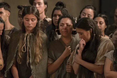 People mourn as they watch Abinadi being put to death.