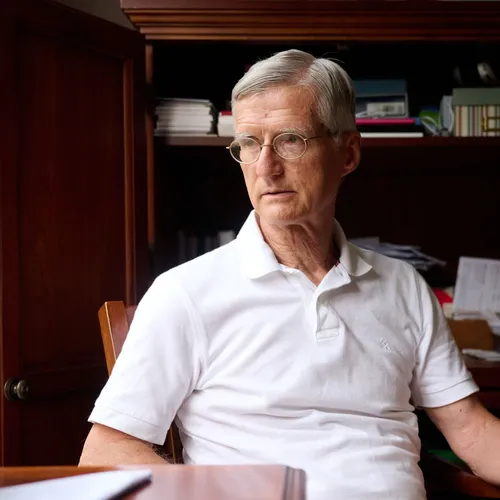 man sitting at desk