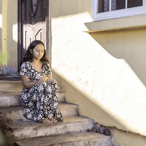 young woman with eyes closed