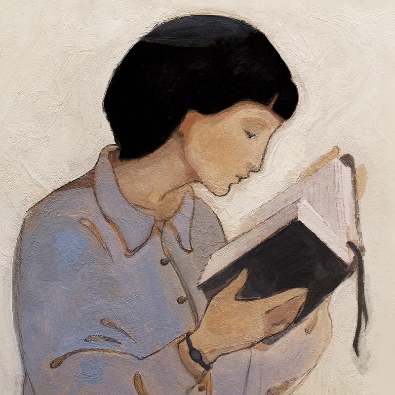 A woman reading the scriptures learning about the teachings of Jesus Christ