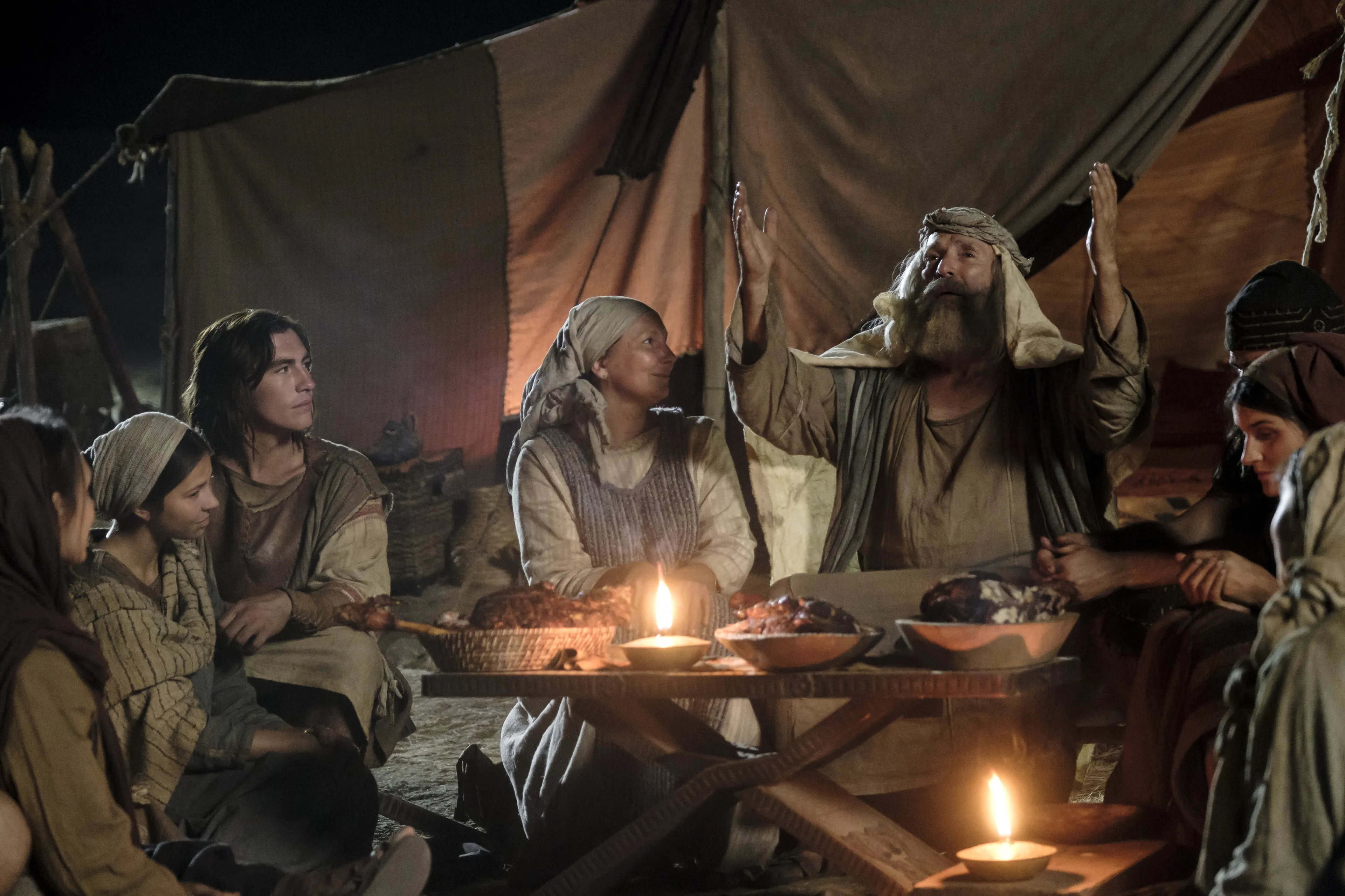 Lehi and Ishmael's families give thanks in the wilderness.