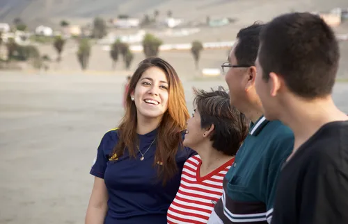 young woman smiling with family