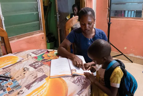 mother reading with child