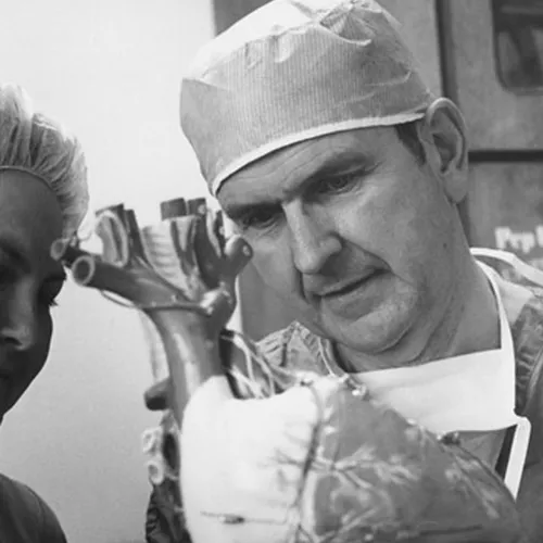 Russell M. Nelson looking at model of heart