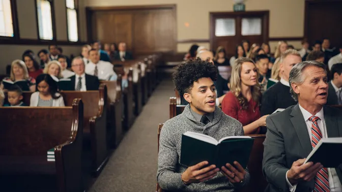 A church congregation singing hymns