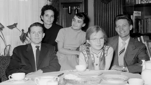 family gathered in a room