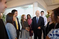 Youth greet Russell M. Nelson after he has spoken to them