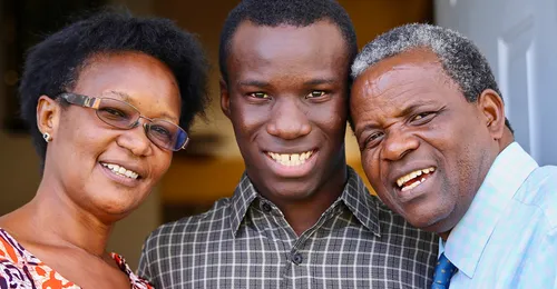 young man with parents