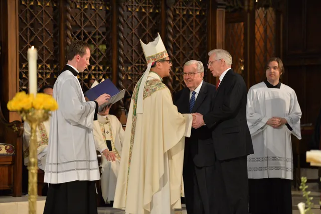 Elder M. Russell Ballard and Elder D. Todd Christofferson of the Quorum of the Twelve Apostles are greeted by Catholic Bishop Oscar A. Solis on Tuesday afternoon, March 7, 2017, at the Cathedral of the Madeleine in Salt Lake City.