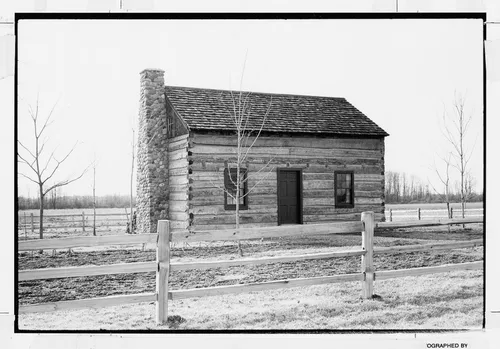 The reconstructed log home of Peter Whitmer