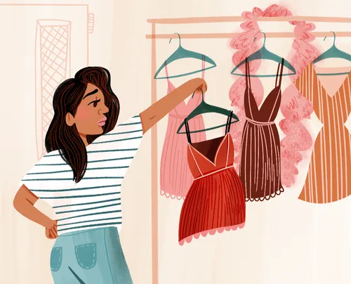 young woman trying on a dress