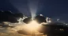 sun shining through clouds