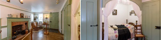 Parlor room with fireplace and bed alcove.