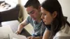 young couple studying scriptures