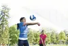 youth playing volleyball