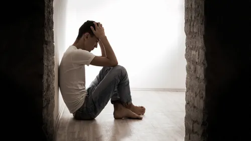 young man feeling depressed