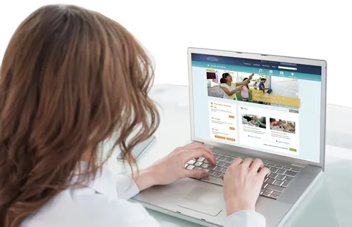 young woman using laptop