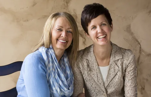 mother and daughter sitting together