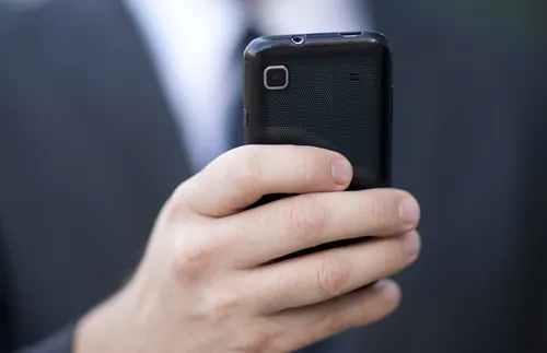 hand holding a cell phone