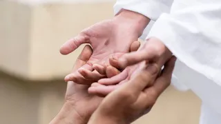 Jesus Christ’s hands showing the nail prints from his crucifixion in Jerusalem. 