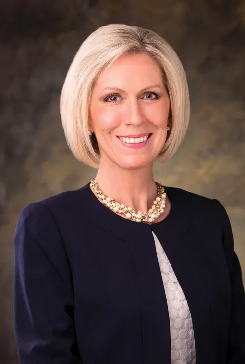 A formal portrait of Joy D. Jones wearing a black blazer.