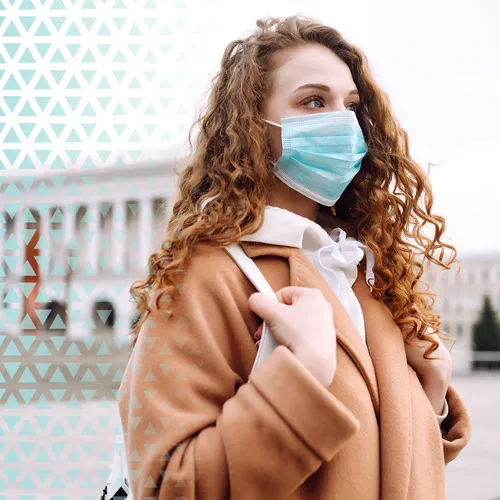 young woman wearing protective mask