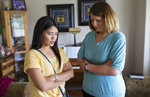 visiting teaching companions praying together
