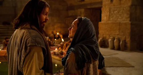 Jesus talking to Mary at wedding feast