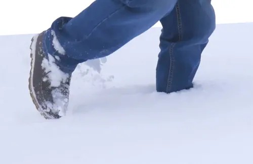legs walking in snow