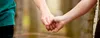 a couple holding hands