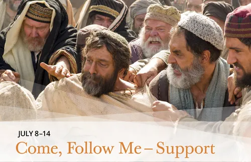 Stephen being dragged away by crowd