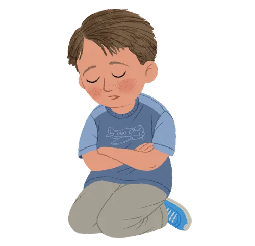 A boy kneeling and praying