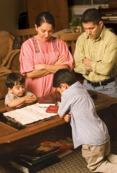 family praying