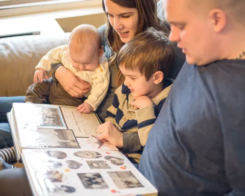 family looking at books