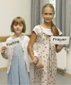 girls holding wordstrips